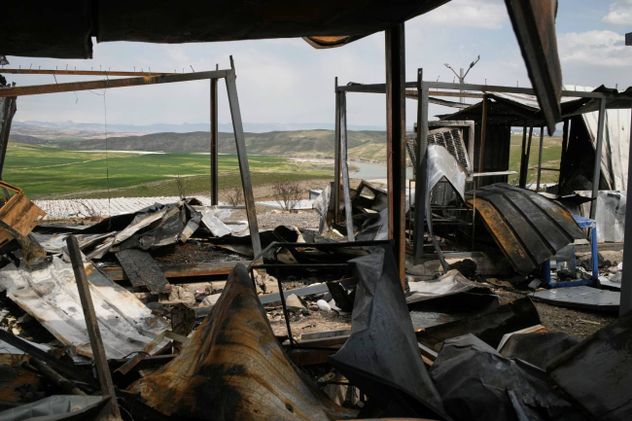 A military base of the Kurdish-Iranian opposition group Kurdistan Freedom Party (PAK) damaged in Iranian drone attacks last week is seen on the outskirts of Erbil, Iraq, Wednesday, March 11, 2026.