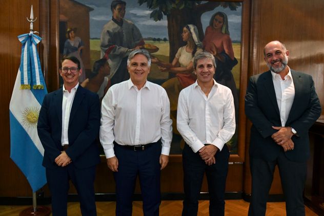 Martín Llaryora y Luis Caputo.