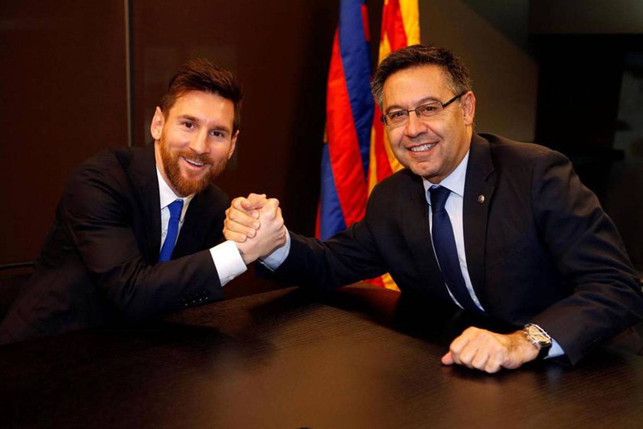Messi junto a Josep Bartomeu.
