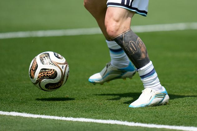 Lionel Messi (10), de Argentina, en el centro, calienta para el partido final de la Copa Mundial de Fútbol entre España y Argentina en East Rutherford, Nueva Jersey, cerca de Nueva York, el domingo.