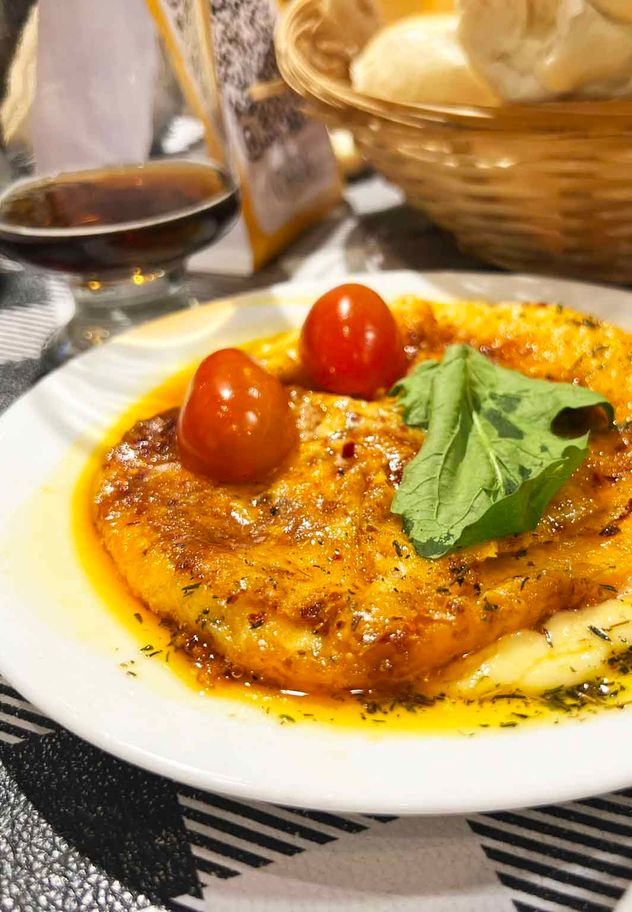 Provoleta de Lo de Choca Bodegón.