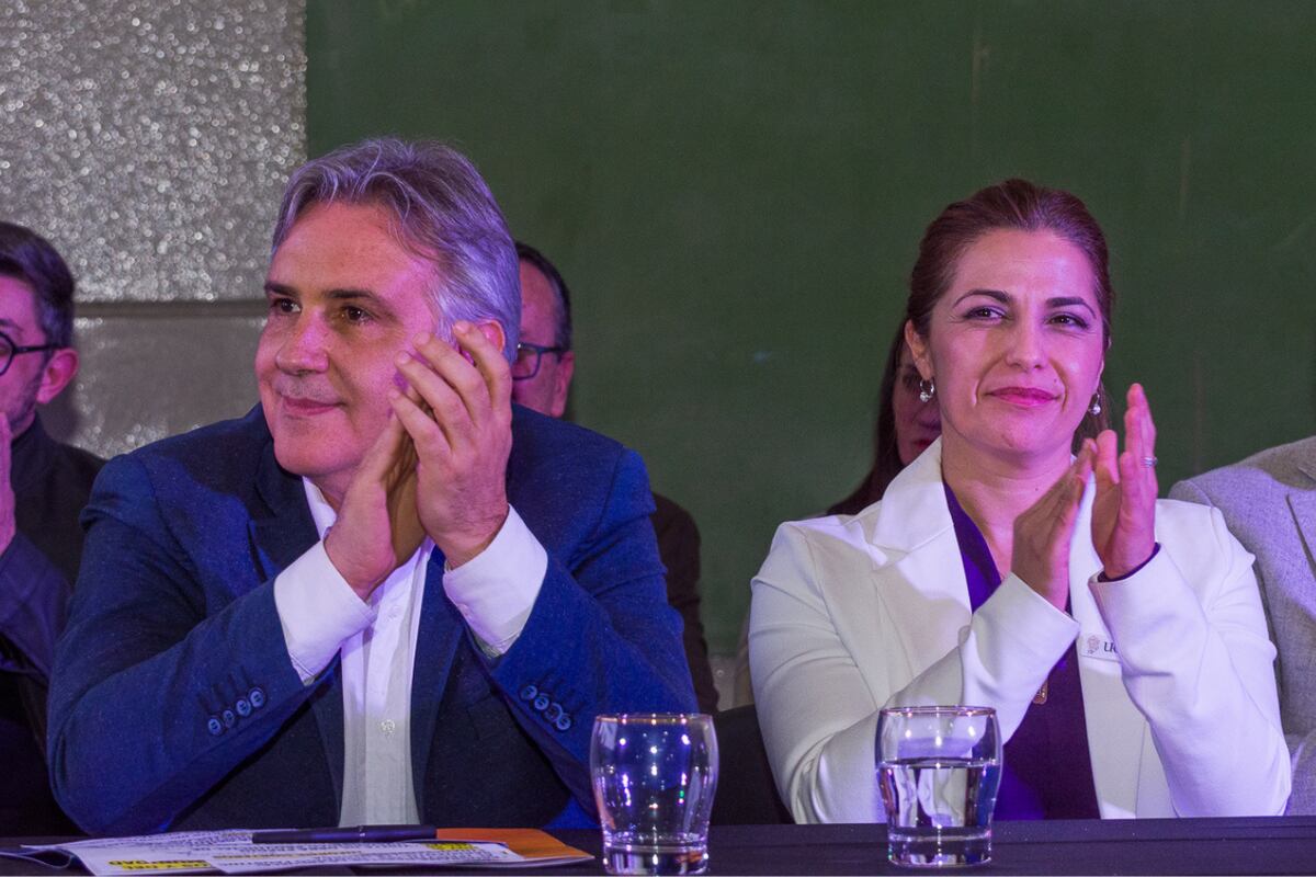 El gobernador Martín Llaryora y la rectora Julia Oliva Cúneo.