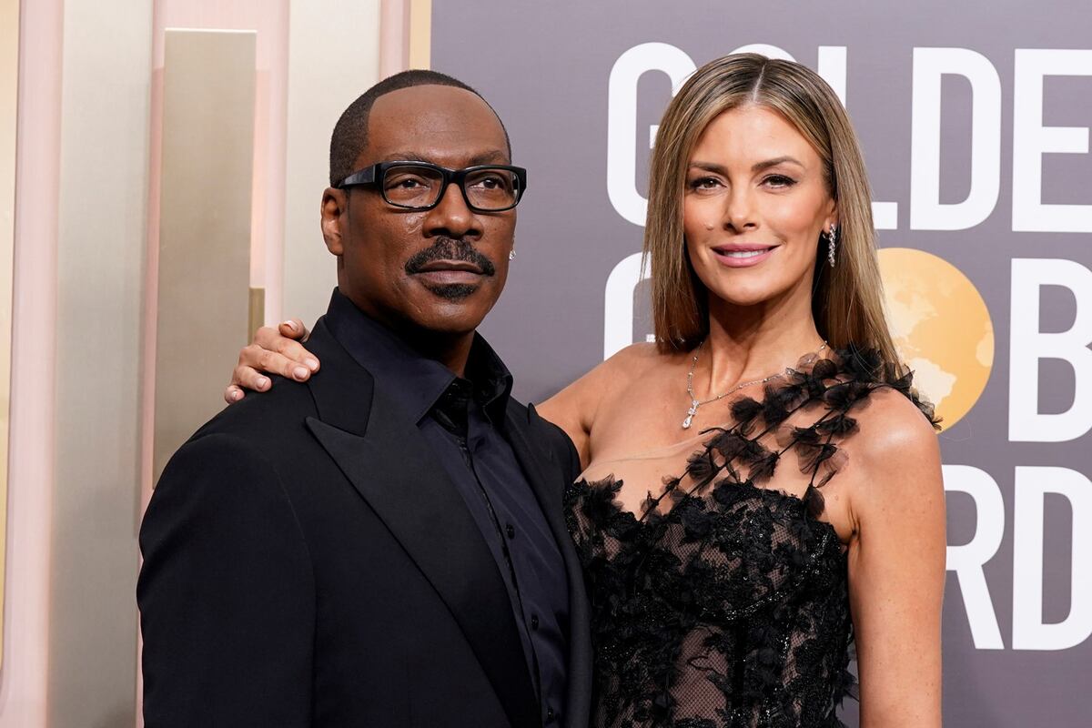 Eddie Murphy y Paige Butcher (Jordan Strauss/Invision/AP)