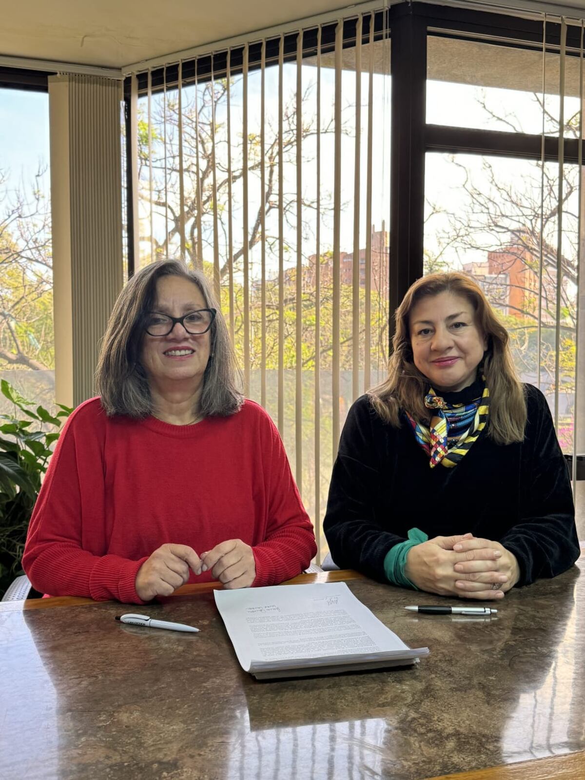 Laura Cantore (Presidenta de la Fundación Una Puerta) y Marta Gaitán (Presidenta del Comité de Equidad de Género de Cooperar).