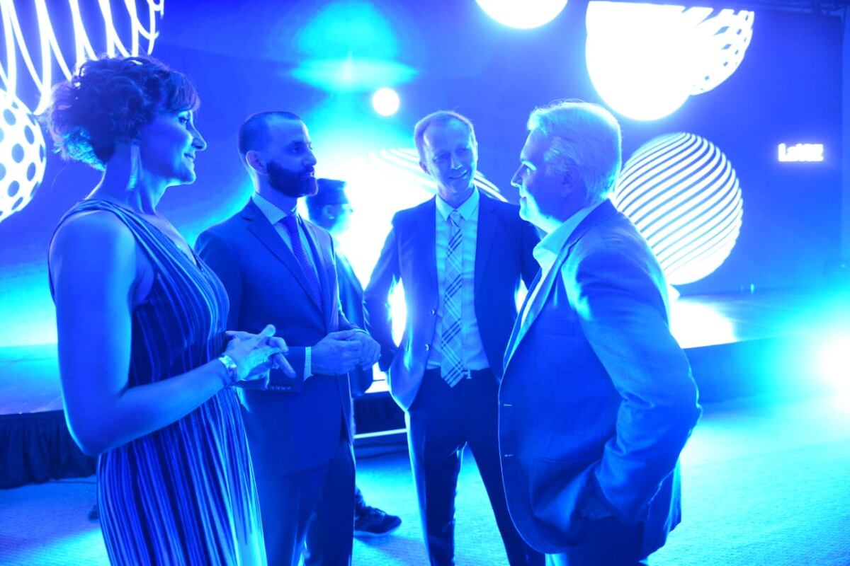 Natalia Buttigliengo, Franco Buttigliengo y Martín Buttigliengo, junto al intendente de Córdoba, Martín Llaryora. (La Voz)
