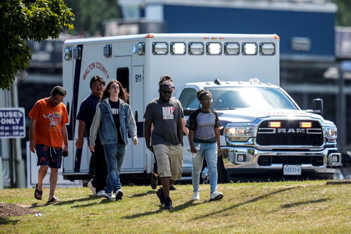 Masacre y dolor en Georgia. (AP/Mike Stewart)