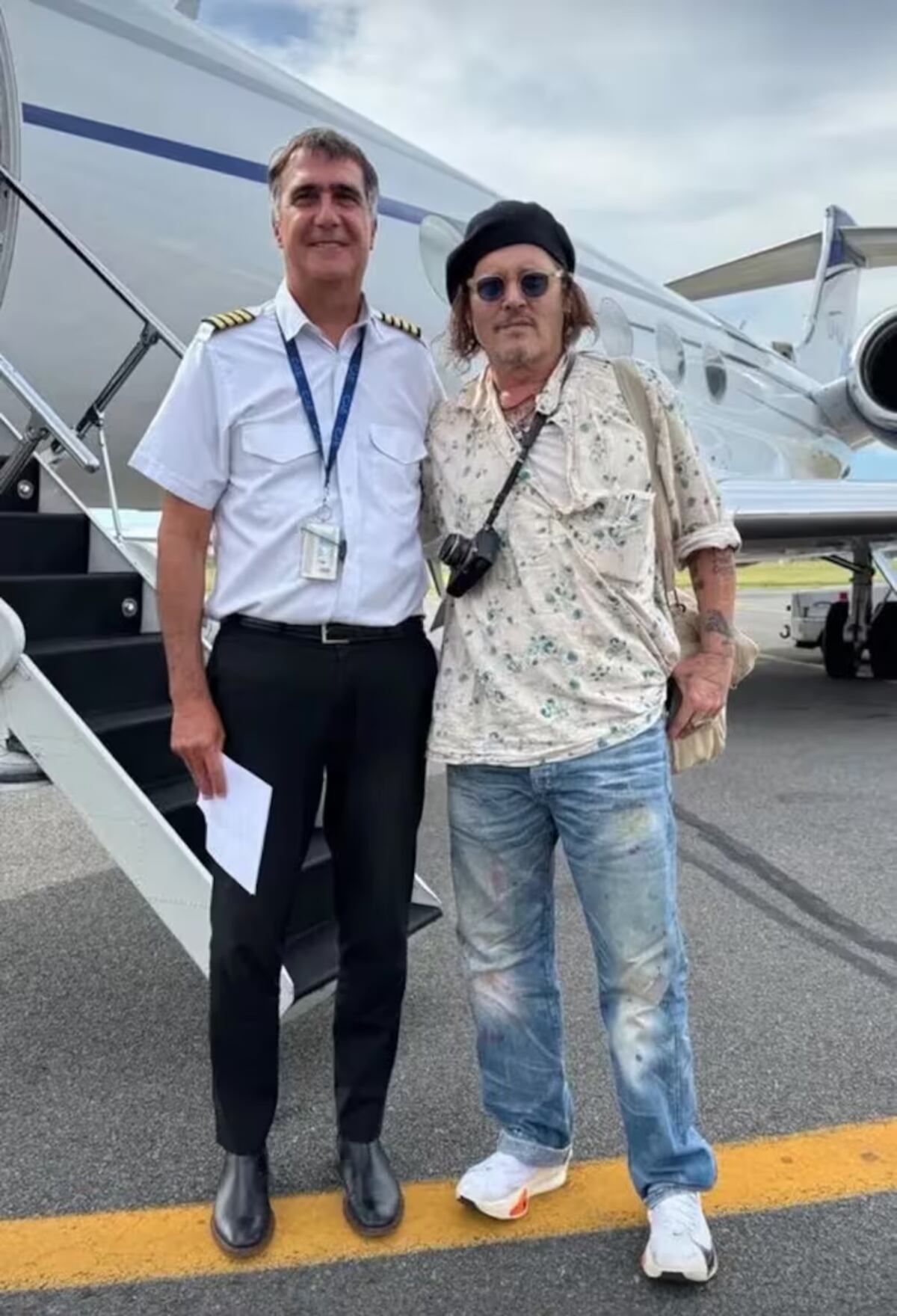 Johnny Depp junto a Antonio Laje.